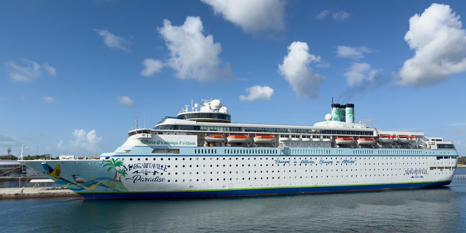 Margaritaville at Sea Paradise, a sister ship in the line's current fleet, docked in Nassau, Bahamas with Margaritaville branding on the hull