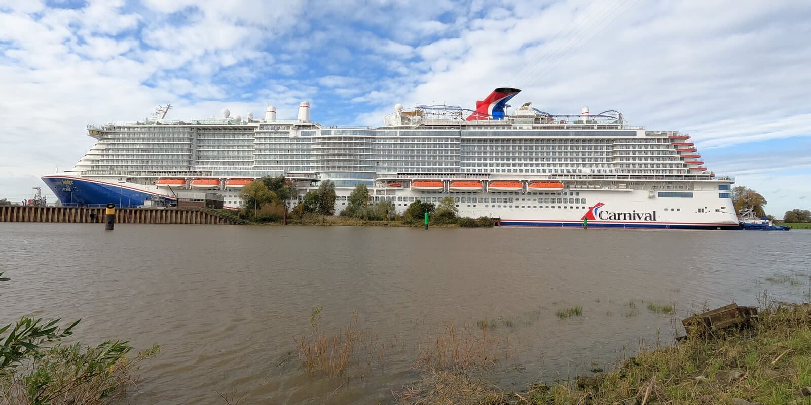 Carnival Jubilee cruise ship exterior in profile, Excel-class funnel and hull visible